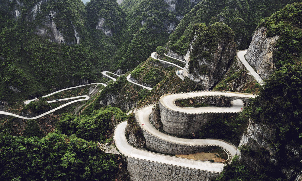 China --- Mountain road, China --- Image by © Yi Lu/Viewstock/Corbis