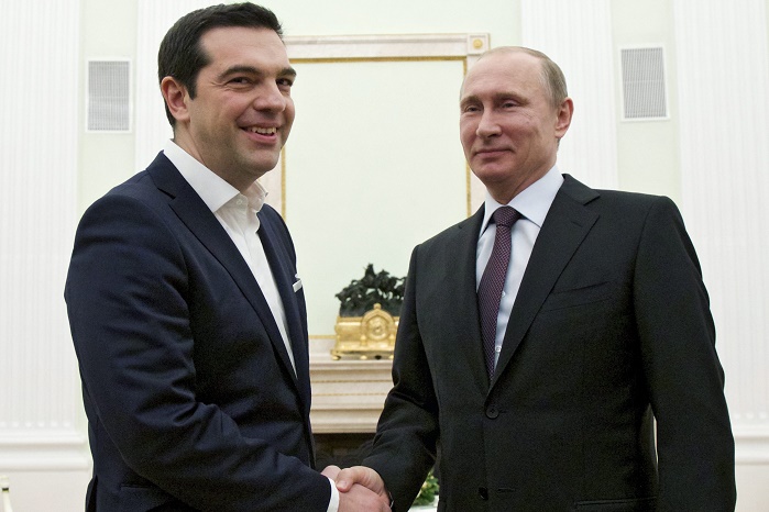 epa04695314 Russian President Vladimir Putin (R) welcomes visiting Greek Prime Minister Alexis Tsipras (L) during their meeting in Moscow's Kremlin, Russia, 08 April 2015. Greek Prime Minister Alexis Tsipras was holding talks with Russian President Vladimir Putin in Moscow in an effort to boost economic cooperation, investment and trade relations between the two countries.  EPA/ALEXANDER ZEMLIANICHENKO/POOL