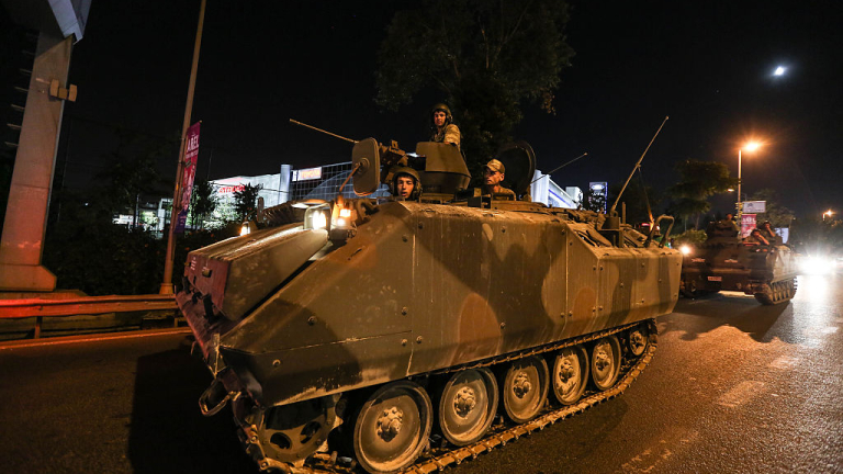 ISTANBUL, TURKEY - JULY 16: Turkish Armys APC's move in the main streets in the early morning hours of July 16, 2016 in Istanbul, Turkey. Istanbul's bridges across the Bosphorus, the strait separating the European and Asian sides of the city, have been closed to traffic. Reports have suggested that a group within Turkey's military have attempted to overthrow the government. Security forces have been called in as Turkey's Prime Minister Binali Yildirim denounced an 'illegal action' by a military 'group', with bridges closed in Istanbul and aircraft flying low over the capital of Ankara (Photo by Defne Karadeniz/Getty Images)