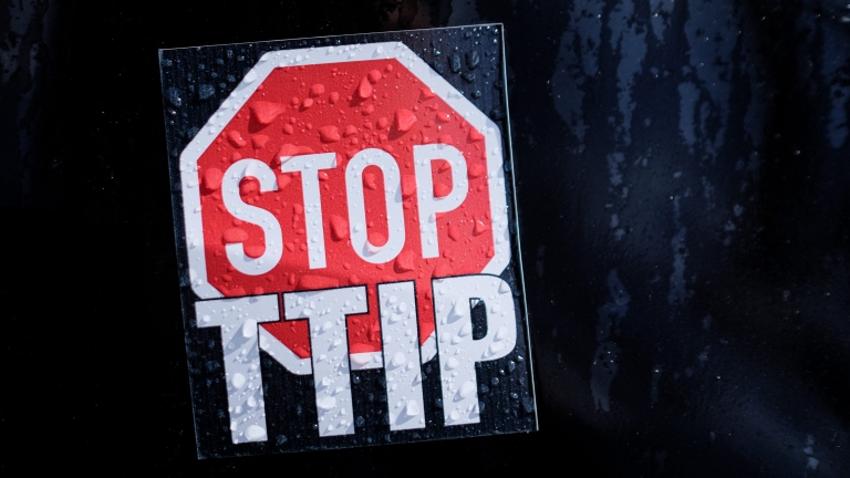 epa05275178 A sticker that reads 'Stop TTIP' pictured on a car during a rally against the TTIP in Hanover, Germany, 24 April 2016. TTIP refers to the Transatlantic Trade and Investment Partnership, a proposed trade agreement between the European Union (EU) and the United States. The world's largest industrial show Hanover Fair is to be opened by US President Obama later in the day.  EPA/OLE SPATA