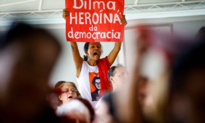 epa05517337 Supporters of suspended Dilma Rousseff protest against her dismissal, at the Palacio de Alborada in Brasilia, Brazil, 31 August 2016. Brazil's Senate on 31 August 2016 voted to impeach President Dilma Rousseff after finding her guilty of manipulating the state budget. Interim President Michel Temer will complete her mandate, which ends on 01 January 2019.  EPA/FERNANDO BIZERRA JR