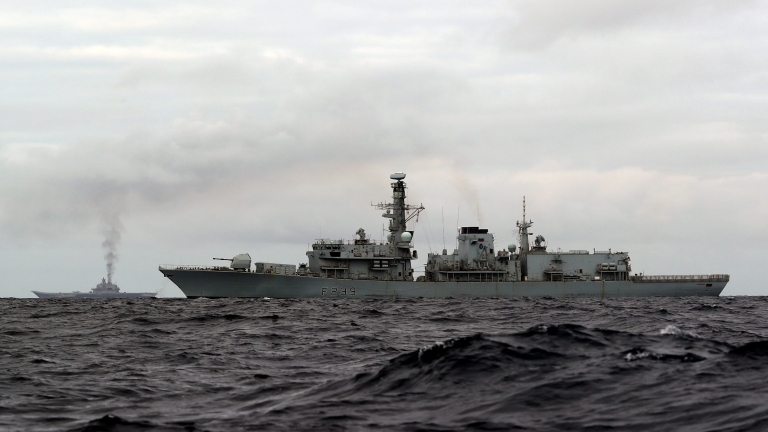 epa05592469 A handout photograph made available by the British Ministry of Defence showing British Royal Navy, HMS Richmond, a Type 23 Duke Class frigate, shadowing Russian aircraft carrier Admiral Kuznetsov (L) part of the Russian Task Force Carrier Group, sailing south from the Norwegian Sea, on 19 October 2016 which is understood to be on transit to the Mediterranean Sea. At present the route which the Russian ships will take past the British Isles via the English Channel or west of Ireland is not known. The Russian Task Group, which includes the sole Russian aircraft carrier, Admiral Kuznetsov, the nuclear powered Kirov Class Battlecruiser, Pyotr Velikiy and two Udaloy Class Destroyers, Vice Admiral Kulakov and Severomorsk sailed from Russia on Saturday 15 October 2016.

P  EPA/PO(Phot) DEZ WADE / BRITISH MINISTRY OF DEFENCE / HANDOUT MANDATORY CREDIT CROWN COPYRIGHT HANDOUT EDITORIAL USE ONLY/NO SALES