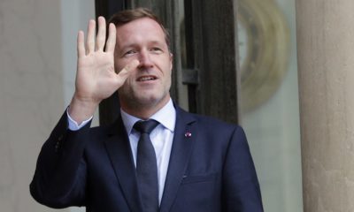 FILE - In this Friday, Oct. 14, 2016 file photo, Minister-President of Wallonia Paul Magnette waves to journalists as he arrives for a meeting with French President Francois Hollande at the Elysee Palace, In Paris. The small Belgian region of Wallonia is currently holding up the signature of a landmark free trade deal uniting over 500 million European Union citizens and 35 million Canadians. (AP Photo/Christophe Ena, File)