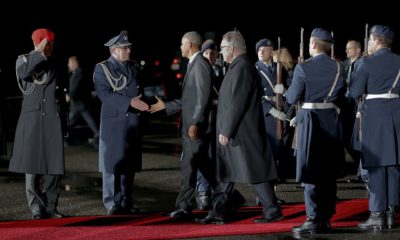 President Barack Obama shakes hand with the officer of the guard of honor on the tarmac upon his arrival to Tegel International Airport in Berlin, Wednesday, Nov. 16, 2016. Walking with Obama is Ambassador Jurgen Mertens, German Chief of Protocol. (AP Photo/Pablo Martinez Monsivais)