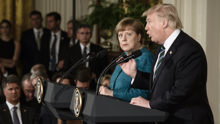 epa05855121 US President Donald J. Trump (R) and German Chancellor Angela Merkel (L) speak during a joint news conference in the East Room of the White House in Washington, DC, USA, 17 March 2017. Merkel's original visit on 14 March had to be postponed due to bad weather.  EPA/CLEMENS BILAN
