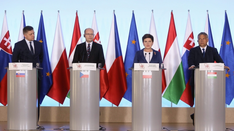 epa05434752 Polish Prime Minister Beata Szydlo (2-R), Hungarian Prime Minister Viktor Orban (R), Slovakia's Prime Minister Robert Fico (L) and Czech Prime Minister Bohuslav Sobotka (2-L) at a press conference after the Visegrad Group Prime Ministers meeting in Warsaw, Poland, 21 July 2016. The V4 prime ministers talked about the future of the European Union after the Brexit vote in Britain ahead of an informal EU summit in Bratislava in September that is expected to discuss the situation in Europe after Britains decision to leave the bloc. Poland and other V4 countries want to play a role in this discussion PAP/PAWEL SUPERNAK POLAND OUT  EPA/PAWEL SUPERNAK POLAND OUT
