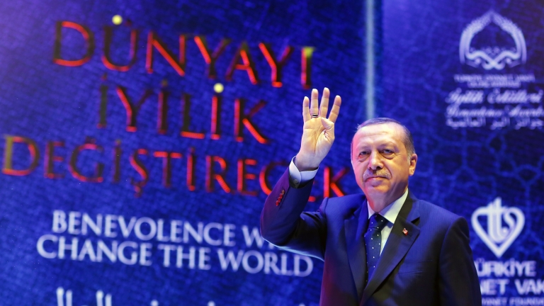 epa05844049 A handout photo made available by the Turkish President Press office shows, Turkish President Recep Tayyip Erdogan waving to his supporters during the International Benevolence Awards ceremony in Istanbul, Turkey, 12 March 2017. The Turkish parliament on 21 January approved a reform of the constitution to change the country's parliamentarian system of governance into a presidential one, which the opposition denounced as giving more power to Turkish president Recep Tayyip Erdogan. A referendum on the amendments is expected to be held in April.  EPA/TURKISH PRESIDENT PRESS OFFICE HANDOUT  HANDOUT EDITORIAL USE ONLY/NO SALES