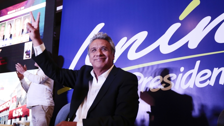 epa05804573 Ecuadorian presidential candidate Lenin Moreno celebrates after knowing a poll result in Quito, Ecuador, 19 February 2017. Government Ecuadorian presidential candidate Lenin Moreno has obtained 39.4 percent of the votes, to center-right opposition candidate Guillermo Lasso's 30.5 percent, according to an exit poll released shortly after the polls closed, by Teleamazonas television.  EPA/JOSE JACOME