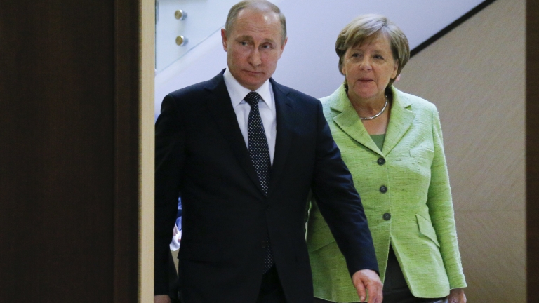 epa05940469 Russian President Vladimir Putin (L) and German Chancellor Angela Merkel (R) meet at the Bocharov Ruchei residence in the Black sea resort of Sochi, Russia, 02 May 2017. German Chancellor Angela Merkel has arrived in Russia for talks with President Vladimir Putin expected to focus on the unresolved conflict in Ukraine and the civil war in Syria.  EPA/ALEXANDER ZEMLIANICHENKO / POOL