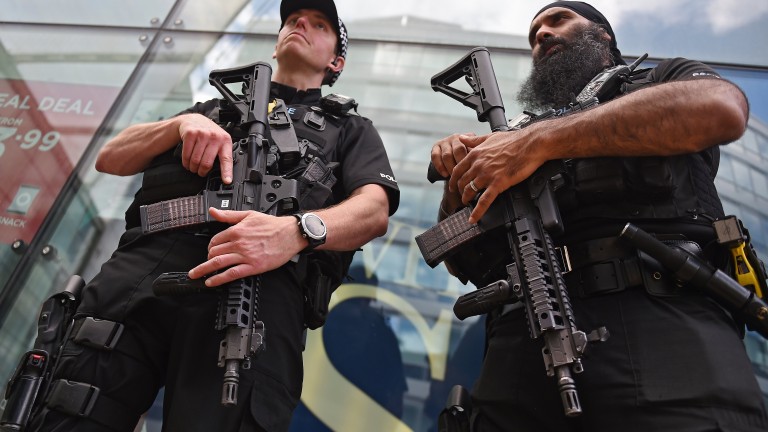 epa05983701 Armed police on patrol in Manchester, Britain, 23 May 2017. According to a statement by the Greater Manchester Police, at least 22 people have been confirmed dead and around 59 others were injured, in an explosion at the Manchester Arena on the night of 22 May at the end of a concert by US singer Ariana Grande. Police believe that the explosion, which is being treated as a terrorist incident, was carried out by a single man using an improvised explosive device (IED), who was confirmed dead at the scene. British Prime Minister Theresa May in the meantime had condemned the incident as 'an appalling terrorist attack.'  EPA/ANDY RAIN