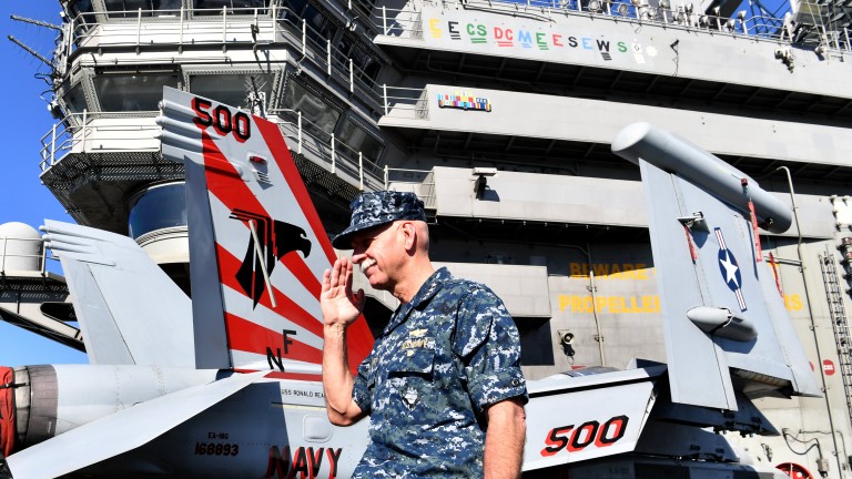 epa06107879 Commander of the US Pacific Fleet Admiral Scott Swift salutes during a closing ceremony for Exercise Talisman Saber 2017 aboard the USS Ronald Reagan in Brisbane, Australia, 25 July 2017. Exercise Talisman Saber 2017 involved more than 30,000 Australian and United States military personnel in the planning and conduct of air, land and maritime war drills.  EPA/DARREN ENGLAND  AUSTRALIA AND NEW ZEALAND OUT