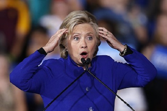 Democratic presidential candidate Hillary Clinton gestures as she speaks at a campaign rally imagining if her supporters don't do everything possible to elect her and Republican presidential candidate Donald Trump is elected, Wednesday, Nov. 2, 2016, in Tempe, Ariz. (AP Photo/Ross D. Franklin)