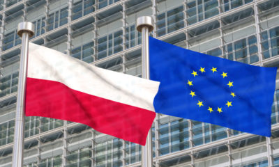 Poland and European flags waving in the wind (3D rendered)