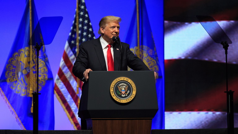 epa07125438 US President Donald J. Trump speaks to the Future Farmers of America convention at the Banker's Life Fieldhouse in Indianapolis, Indiana, USA, 27 October 2018. During the event, President Trump spoke to student of the Future Farmers of America about topics ranging from farming to unemployment. President Trump also made statements denouncing the mass shooting at a synagogue in Pittsburgh, in which 11 people were killed.  EPA/JUSTIN CASTERLINE
