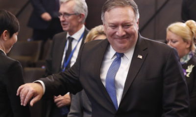 epa07208149 US Secretary of State Mike Pompeo (R), attends the first day of Nato Foreign ministers council at Alliance headquarters in Brussels, Belgium, 04 December 2018. First working session focus on North Atlantic Council relation with Georgia and Ukraine.  EPA/OLIVIER HOSLET