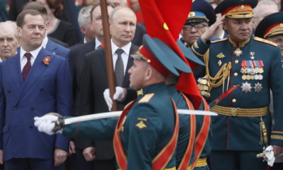 epa07557306 Russian President Vladimir Putin (C) attends a wreath laying ceremony after the Victory Day Parade in Moscow, Russia, 09 May 2019. Russia marks on 09 May the 74th anniversary of the victory in the World War II over Nazi Germany and its allies. The Soviet Union lost 27 million people in the war.  EPA/SERGEI ILNITSKY