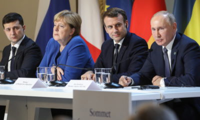 epa08058418 (FromL) Ukrainian President Volodymyr Zelensky, German Chancellor Angela Merkel, French President Emmanuel Macron and Russian President Vladimir Putin give a press conference after a summit on Ukraine at the Elysee Palace, in Paris, France, 09 December 2019. The Normandy format was created in 2014 to resolve the conflict between Kiev and the breakaway republics in Ukraine's east.  EPA/LUDOVIC MARIN  / POOL  MAXPPP OUT