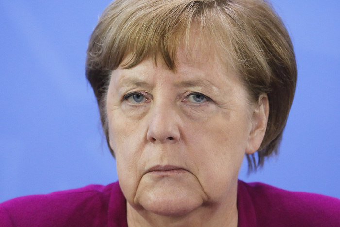 German Chancellor Angela Merkel briefs the media after a meeting with German federal state governors at the chancellery in Berlin, Germany, Wednesday, May 27, 2020. (AP Photo/Markus Schreiber, Pool)