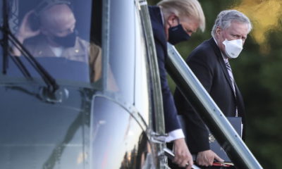 epa08716567 White House Chief of Staff Mark Meadows, right, looks as US President Donald J. Trump exits Marine One while arriving to Walter Reed National Military Medical Center in Bethesda, Maryland, USA, on 02 October 2020. Trump will be treated for Covid-19 after being in isolation at the White House since his diagnosis, which he announced after one of his closest aides had tested positive for coronavirus infection.  EPA/Oliver Contreras / POOL