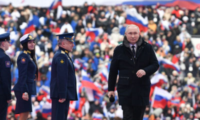 Russian President Vladimir Putin attends a concert dedicated to Russian service members involved in the country's military campaign in Ukraine, on the eve of the Defender of the Fatherland Day at Luzhniki Stadium in Moscow, Russia February 22, 2023. Sputnik/Maksim Blinov/Kremlin via REUTERS ATTENTION EDITORS - THIS IMAGE WAS PROVIDED BY A THIRD PARTY.