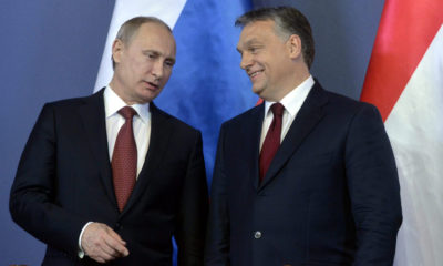 epa04624488 Russian President Vladimir Putin (L) and Hungarian Prime Minister Viktor Orban (R) chat during a signing ceremony in the Parliament building in Budapest, Hungary, 17 February 2015. Putin is staying on a one-day working visit in the Hungarian capital.  EPA/SZILARD KOSZTICSAK HUNGARY OUT
