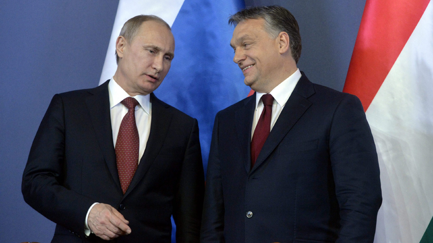 epa04624488 Russian President Vladimir Putin (L) and Hungarian Prime Minister Viktor Orban (R) chat during a signing ceremony in the Parliament building in Budapest, Hungary, 17 February 2015. Putin is staying on a one-day working visit in the Hungarian capital.  EPA/SZILARD KOSZTICSAK HUNGARY OUT